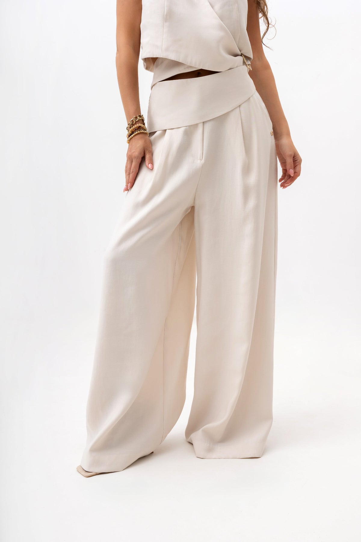 Women's trousers with a decorative belt and wide legs