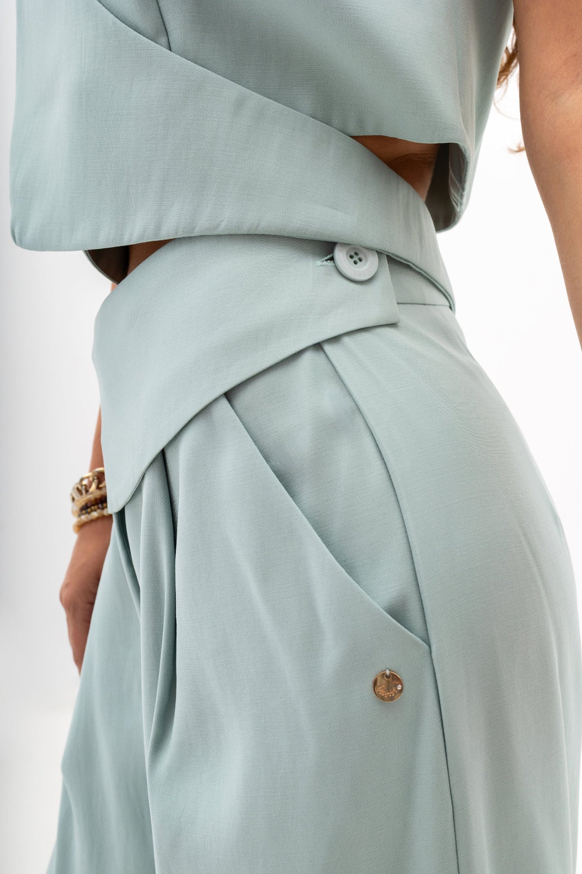 Women's trousers with a decorative belt and wide legs